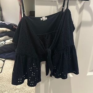 Cute, trendy tie front tank top. Perfect for summer !